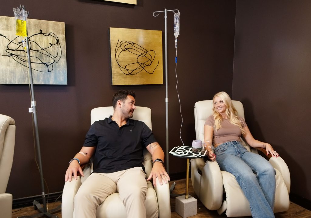 Couple receiving nutritional IV together in Gilbert Onyx office.