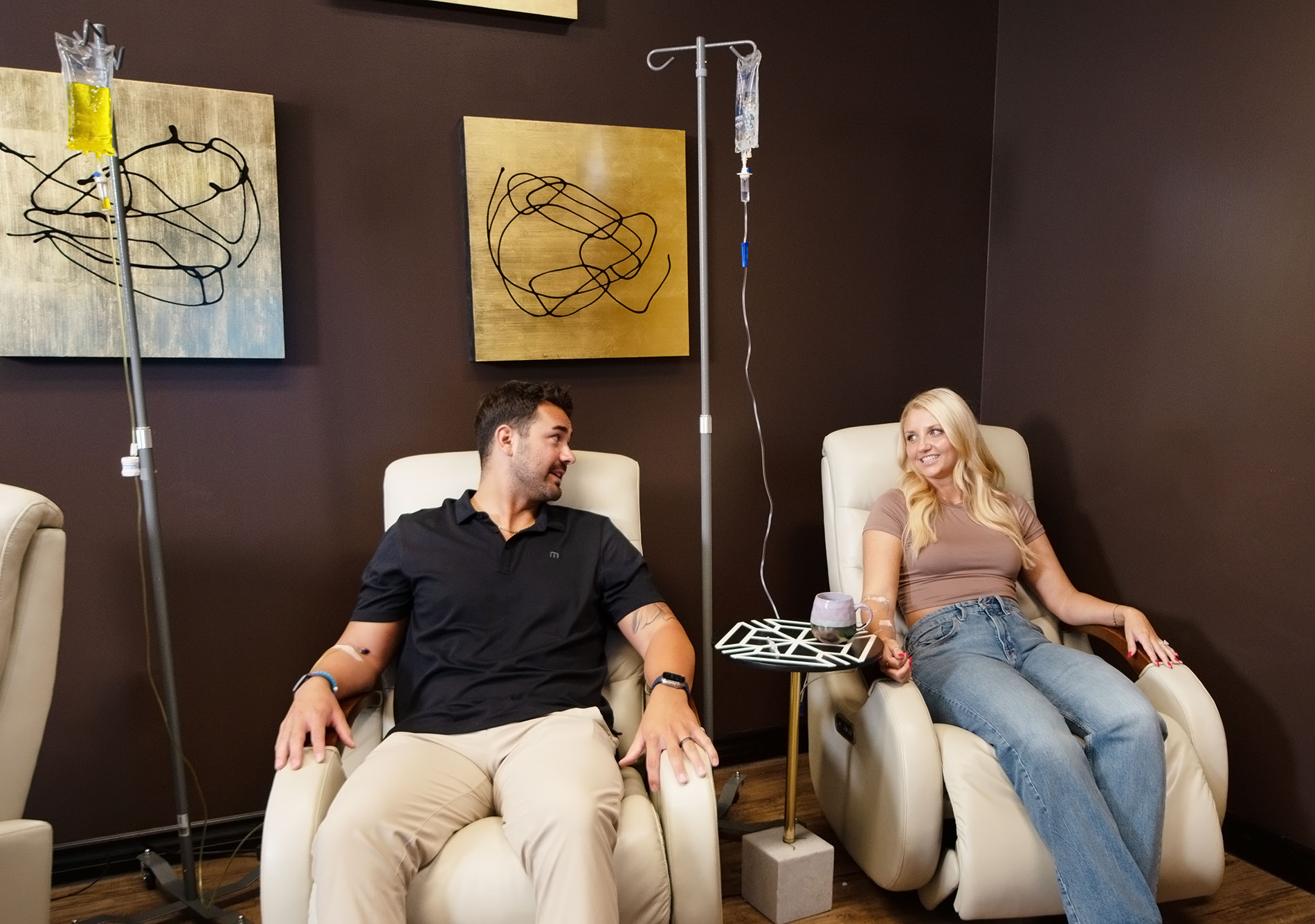 Couple receiving nutritional IV together in Gilbert Onyx office.