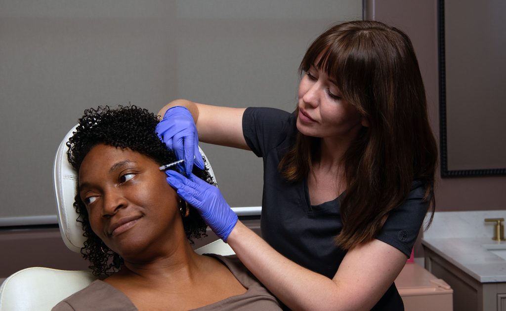 Dr Stephanie giving a Botox treatment to patient in Gilbert, AZ