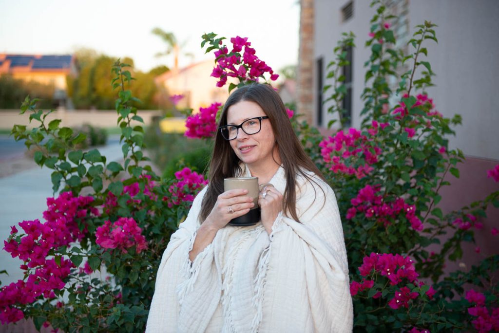 Woman Smiling in robe.